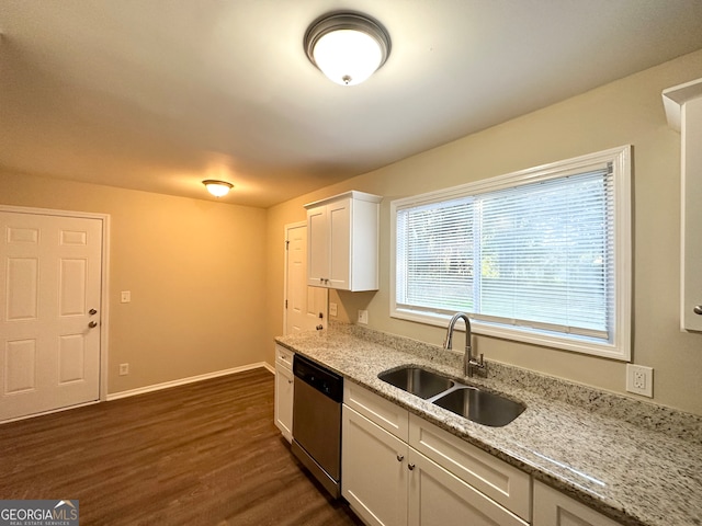 kitchen with dark wood-type flooring, white cabinets, sink, stainless steel dishwasher, and light stone counters