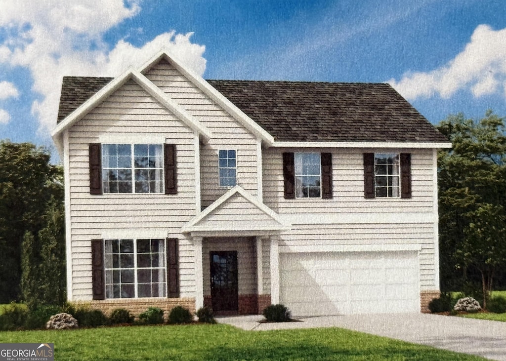 view of front facade featuring a garage and a front yard