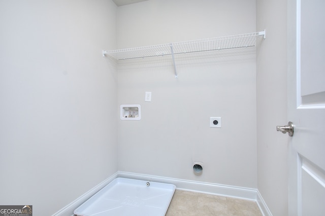 1091 Boulder Dr, Gray, GA 31032 - washroom featuring hookup for a washing machine, hookup for an electric dryer, tile patterned flooring, and baseboards