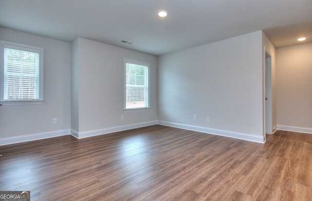 1091 Boulder Dr, Gray, GA 31032 - unfurnished room featuring healthy amount of natural light, wood finished floors, baseboards, and recessed lighting