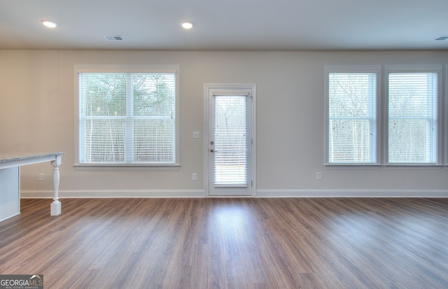 1091 Boulder Dr, Gray, GA 31032 - unfurnished living room with wood finished floors and baseboards