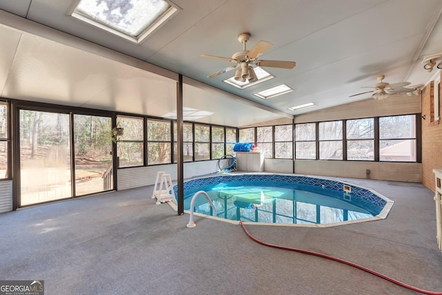 view of pool with a jacuzzi