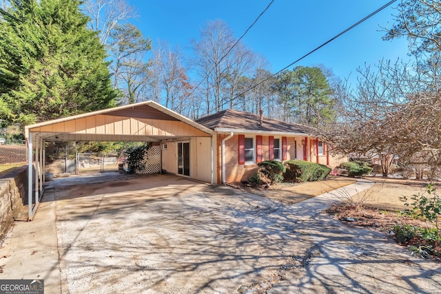 view of property exterior with a carport