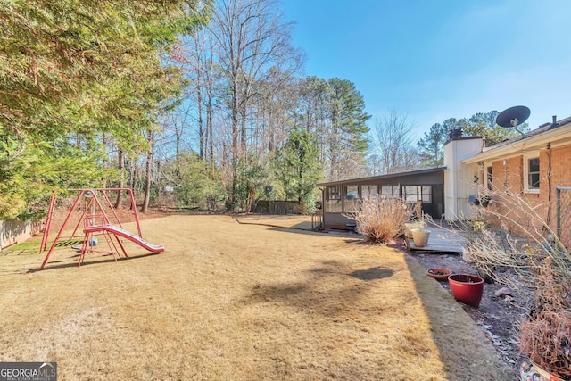 view of yard with a playground