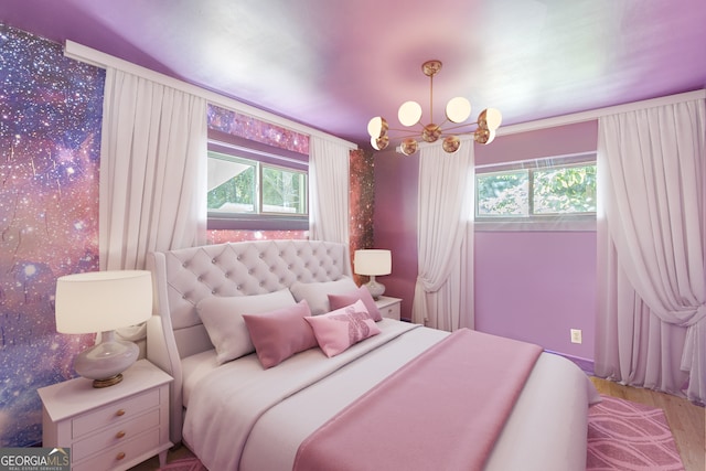 bedroom with light hardwood / wood-style flooring, multiple windows, and a notable chandelier