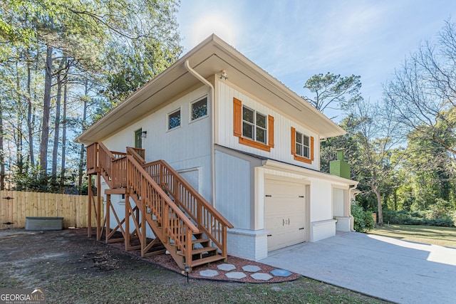 view of side of property featuring a garage