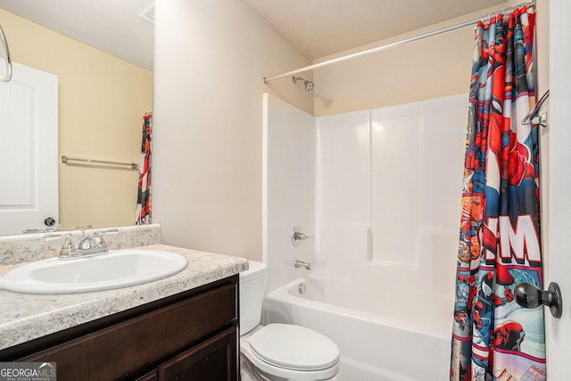 full bathroom with vanity, toilet, and shower / tub combo with curtain