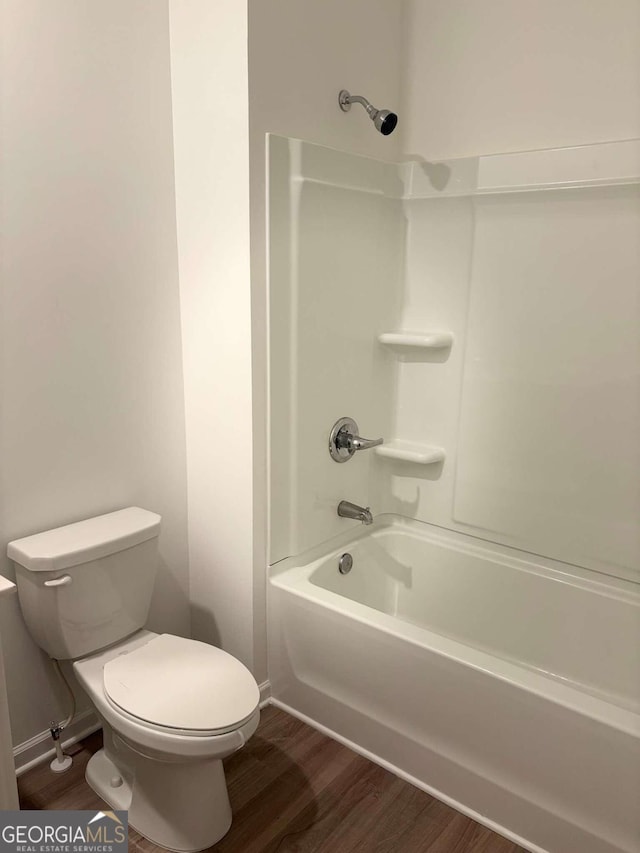 bathroom with tile patterned floors and a shower with shower door