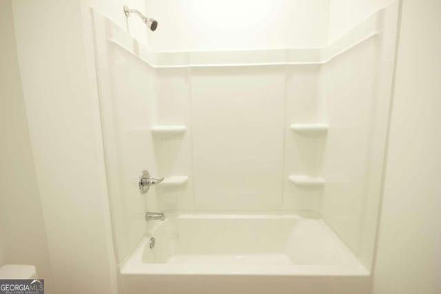 bathroom featuring shower / washtub combination