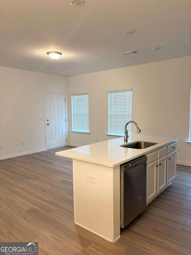 kitchen with sink, hanging light fixtures, decorative backsplash, white cabinetry, and stainless steel appliances