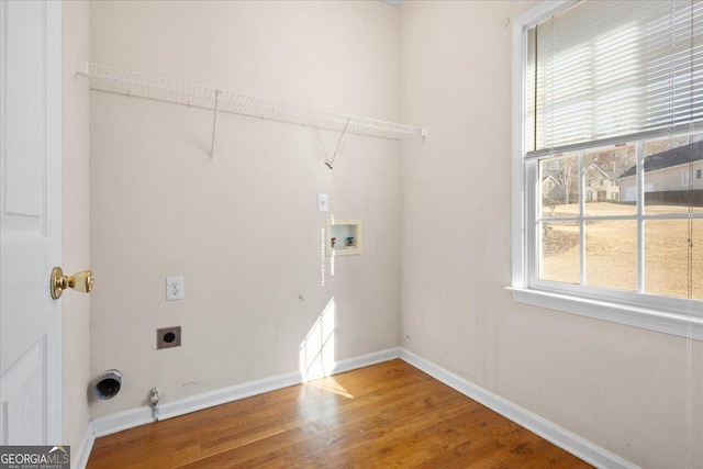 washroom featuring gas dryer hookup, a healthy amount of sunlight, hookup for a washing machine, and electric dryer hookup