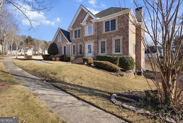 view of front facade with a front lawn