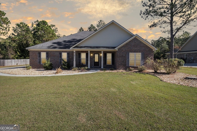 view of front facade with a lawn