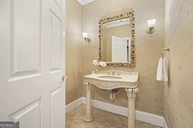 bathroom with tile patterned flooring and ornamental molding