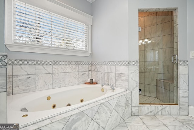 bathroom featuring shower with separate bathtub