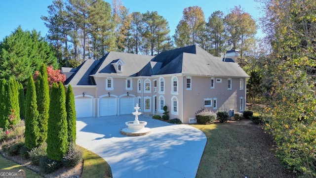 view of front of property with a garage