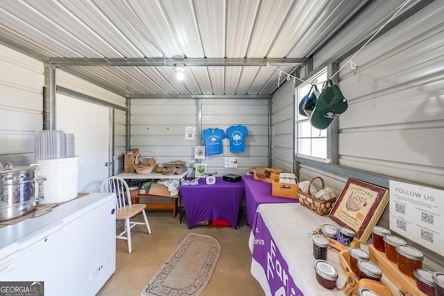 garage featuring refrigerator