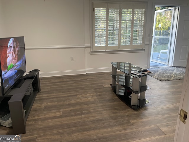 interior space with dark hardwood / wood-style flooring