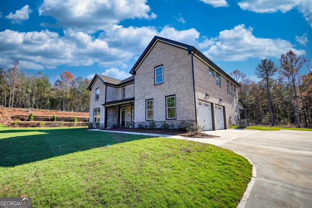 view of side of home with central AC, a garage, and a yard