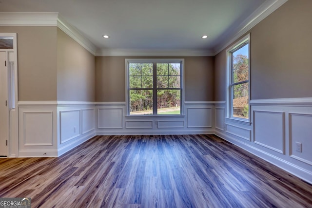 unfurnished room with crown molding, wood finished floors, and recessed lighting