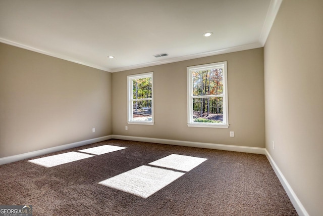 carpeted spare room featuring ornamental molding, recessed lighting, visible vents, and baseboards