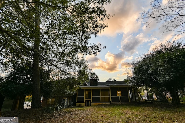 120 Tara Way, Athens, GA 30606 - back of property at dusk featuring a sunroom