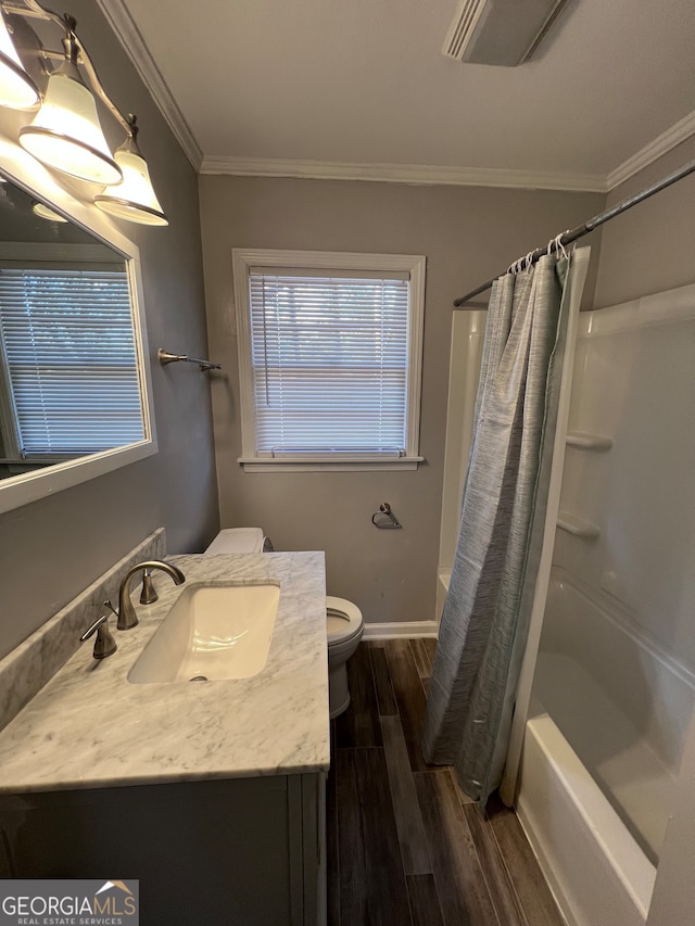 full bathroom featuring crown molding, shower / bath combination with curtain, toilet, vanity, and hardwood / wood-style flooring