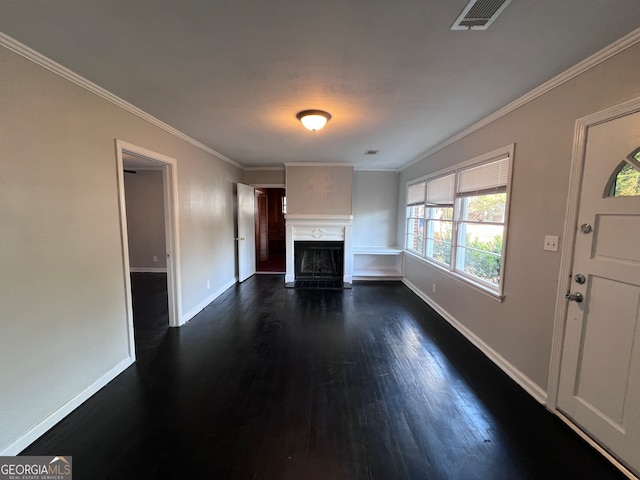 unfurnished living room featuring dark hardwood / wood-style floors and crown molding