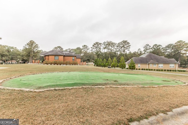 view of community featuring a yard