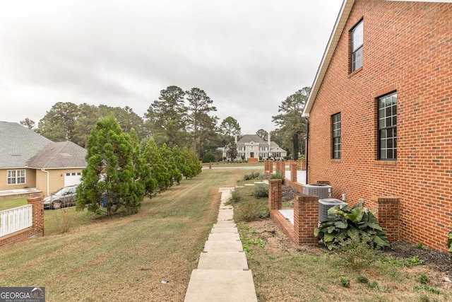 view of home's exterior featuring a lawn