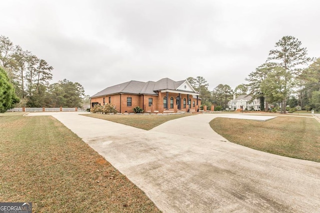 view of front of home with a front yard and a porch