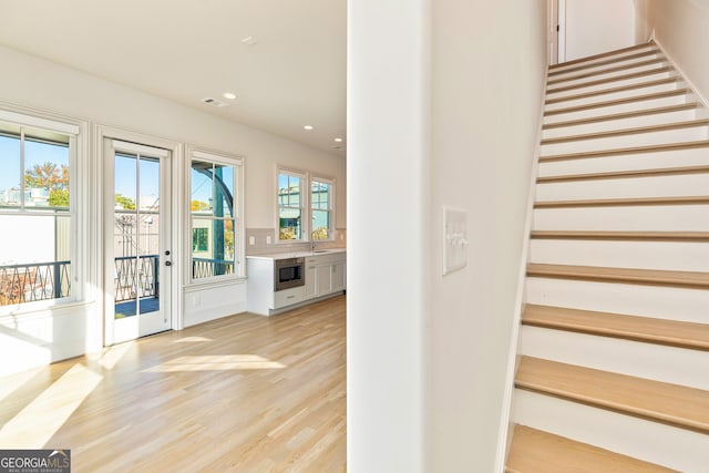 interior space featuring light hardwood / wood-style flooring and sink