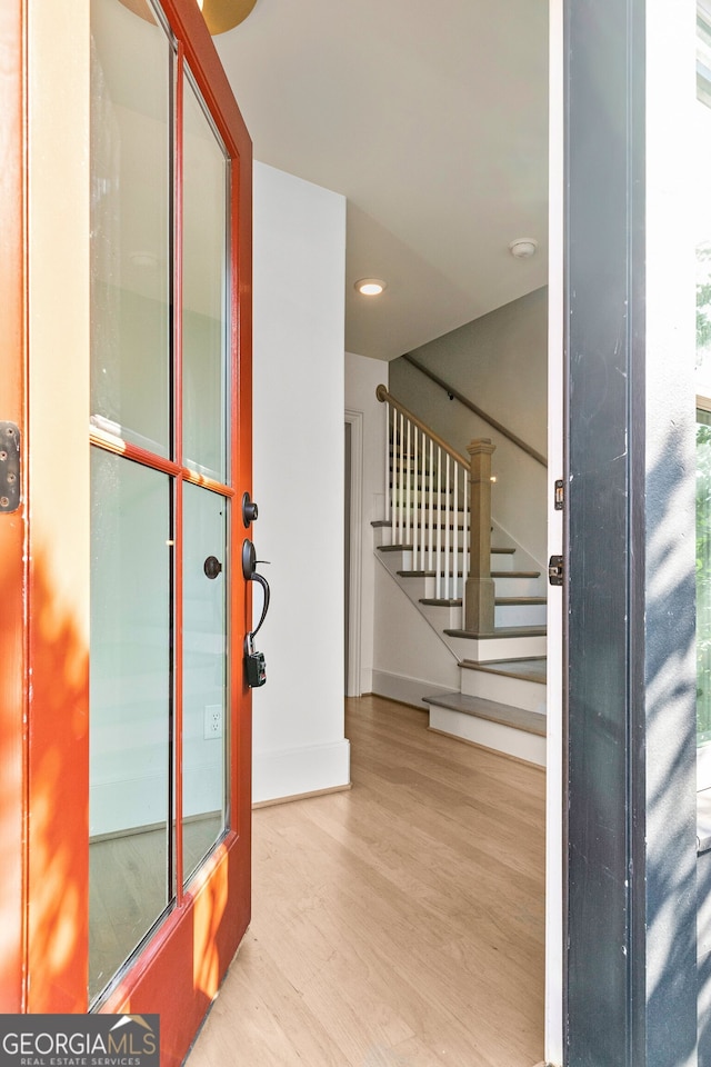 foyer entrance featuring light wood-type flooring