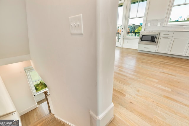 hall featuring light wood-type flooring