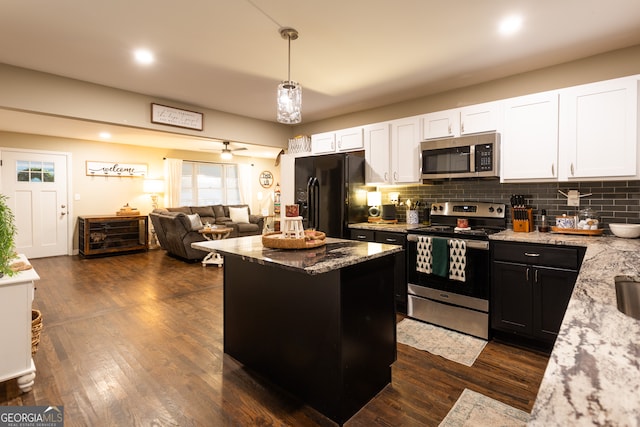 bedroom with ceiling fan and dark hardwood / wood-style floors