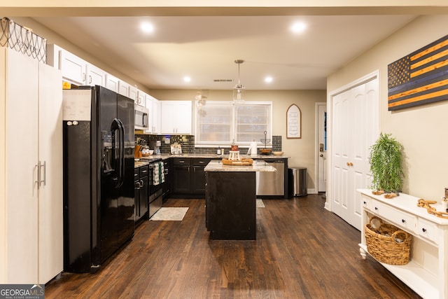 bedroom with a closet, dark hardwood / wood-style floors, and ceiling fan