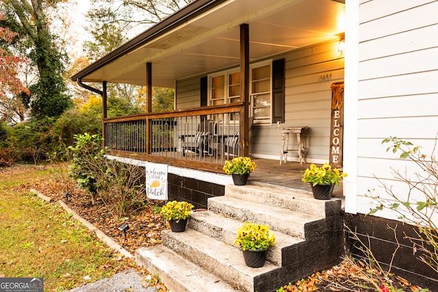 wooden deck featuring a porch