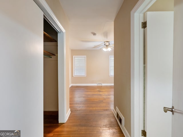 hallway featuring wood-type flooring