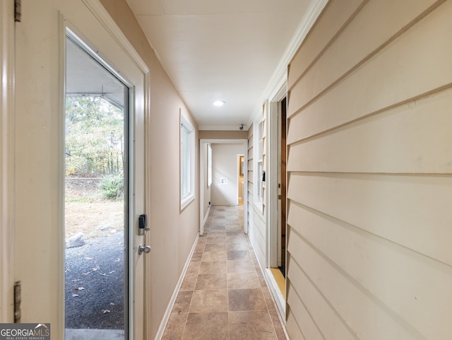 corridor featuring ornamental molding