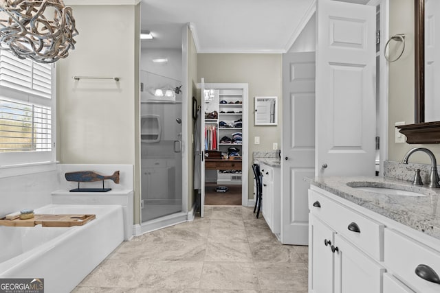 bathroom with crown molding, vanity, and independent shower and bath