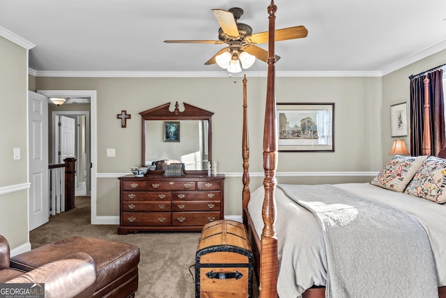 carpeted bedroom featuring ornamental molding and ceiling fan