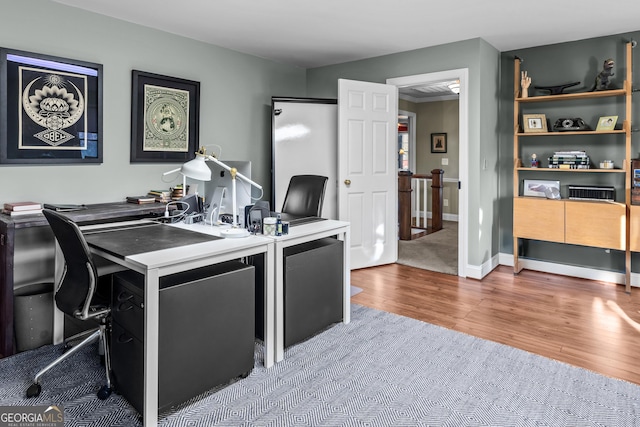 office with hardwood / wood-style floors