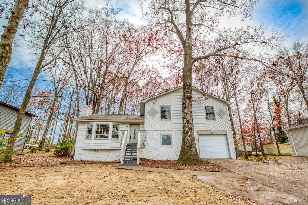 view of front of property with a garage