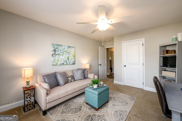 living room featuring ceiling fan and carpet flooring