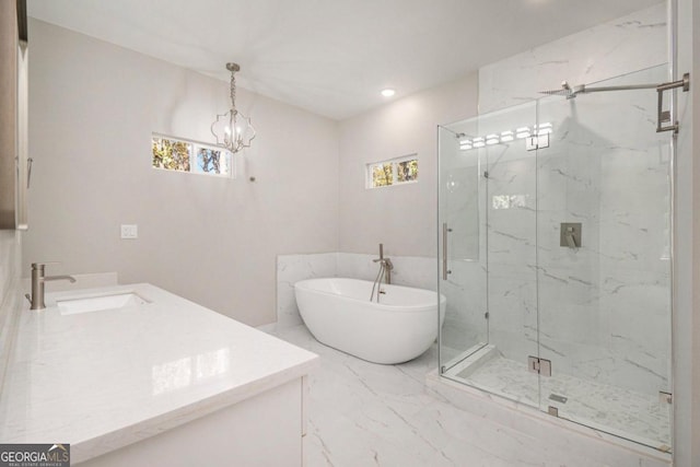 bathroom featuring vanity, plus walk in shower, and a chandelier