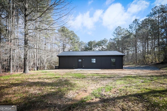 view of outdoor structure with a yard