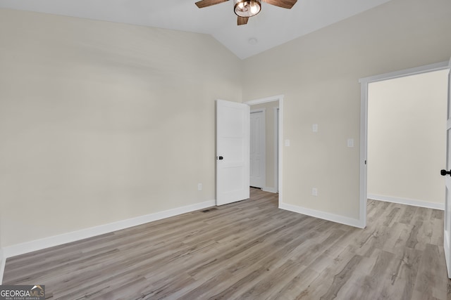 unfurnished bedroom featuring ceiling fan, high vaulted ceiling, and light hardwood / wood-style floors