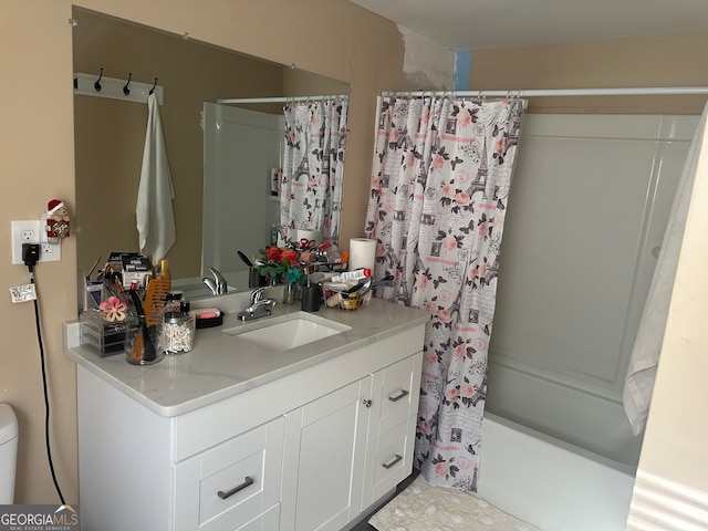 bathroom featuring vanity and shower / tub combo