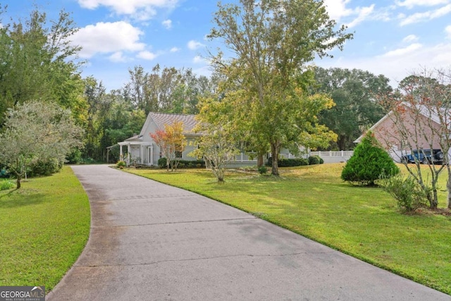 exterior space with a front yard