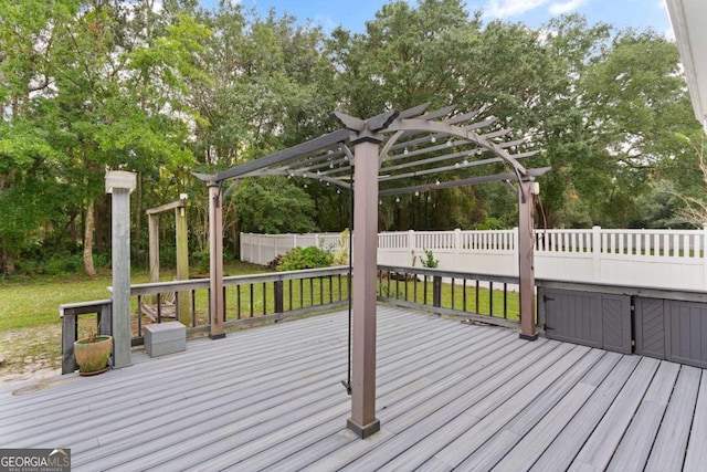 wooden terrace with a pergola and a yard